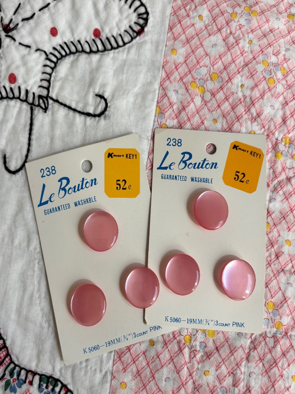 Lot of two vintage Kmart "Le Bouton" cards with glossy pink buttons.
